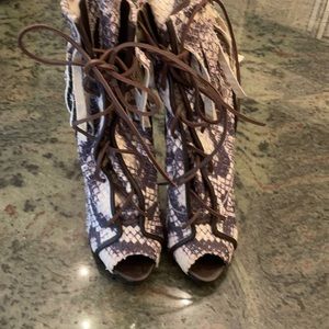 Giuseppe boots with fringe and laces